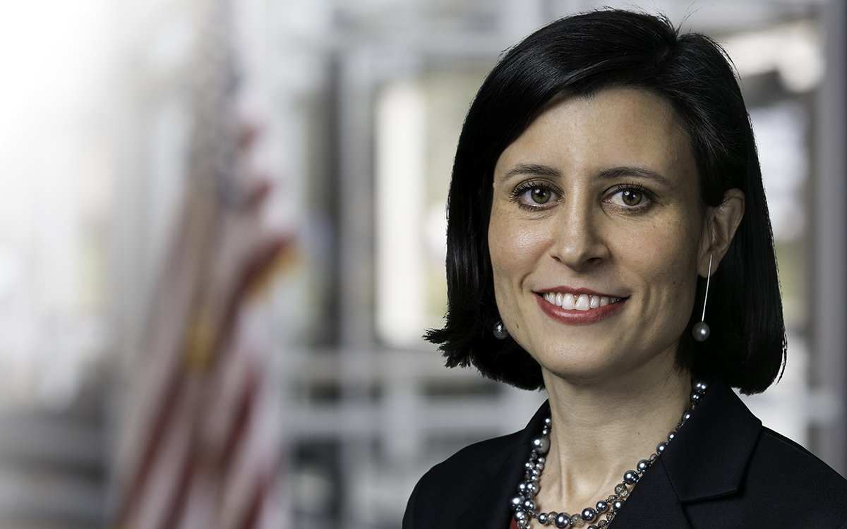 Portrait of AM General's Senior VP of Strategy & Corporate Development, Claudia Gast