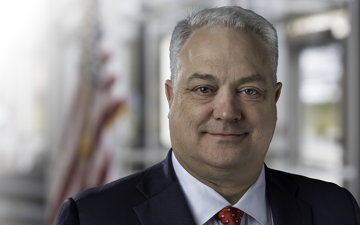 Portrait of AM General's President & Chief Executive Officer R. Andrew Hove