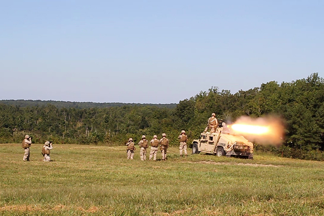 Javelin-TOW Combined anti-armor team marines fire a Humvee mounted TOW missile at Fort Pickett, VA for pre-deployment training