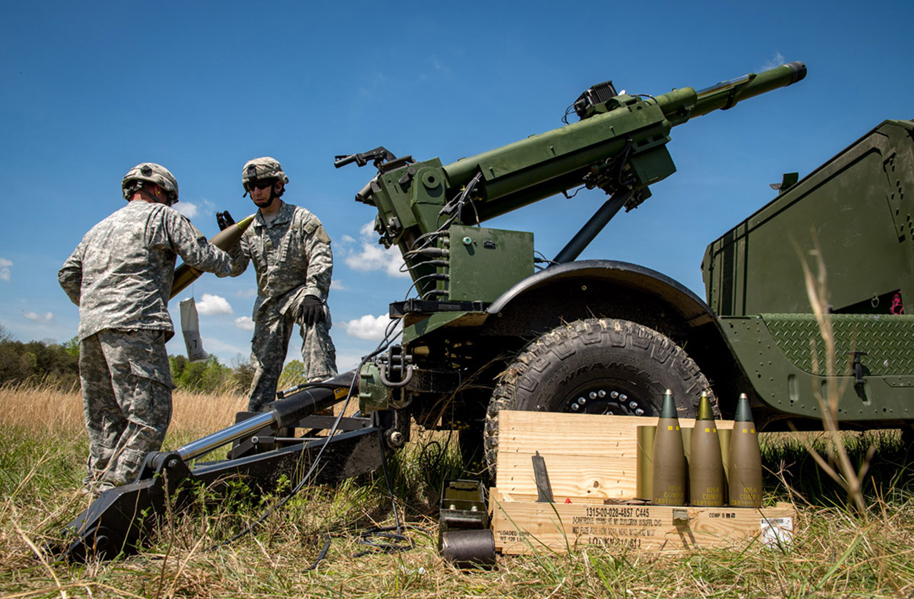 hawkeye-gallery-5 Two U.S. Soldiers operating AM General's Mobile Howitzer Hawkeye