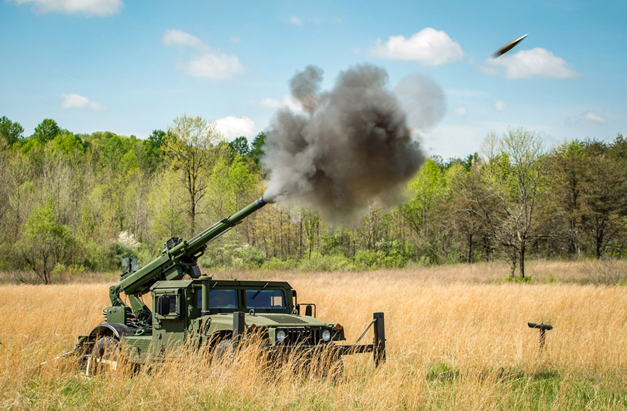 hawkeye-gallery-6 105mm shell in mi-air as it is fired from AM General's Mobile Howitzer Hawkeye